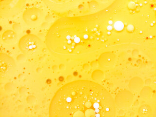 Abstract yellow, white water bubbles background. .Full frame of the textures formed by the bubbles...