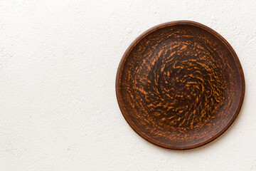 Top view of empty plate on cement background. Empty space for your design