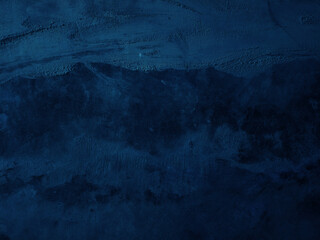 Dark rough cement wall background for graphic design or wallpaper.