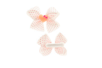 White with red dots satin bow for hair for girl, woman isolated on white background. Scrunchie hair clip accessory for girls and women. Close up