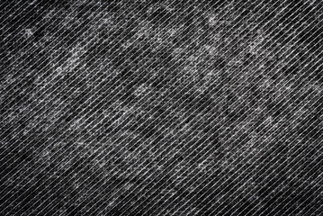 The texture of the fabric is black with straight white stripes. Material for tailoring
