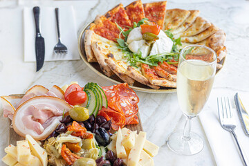 Sharing italian platter on marble table 