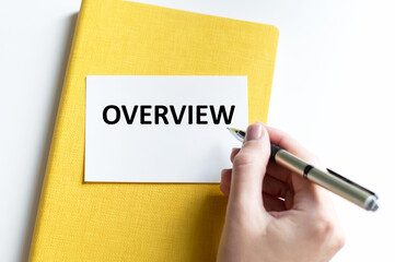 a white blank card with the text OVERVIEW. Business concept