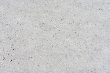 small sand and gravel on path in park at dry sunny summer day