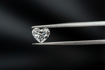 Heart shape diamond with tweezers