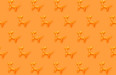 Dog made of balloon on orange background