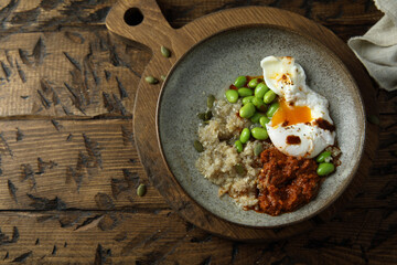 Healthy quinoa bowl with poached egg