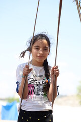 child on swing