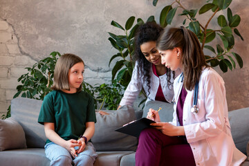 Team pediatricians getting medical history
