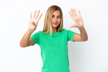 Blonde Uruguayan girl isolated on white background counting nine with fingers