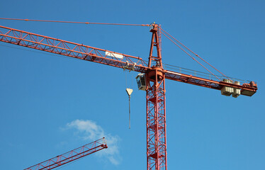 Detail of construction crane with blue sky