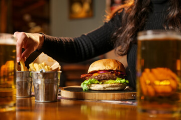 tasty beef sandwich in black background