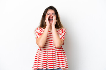 Fototapeta premium Young caucasian woman isolated on white background shouting and announcing something