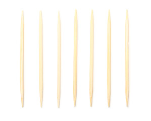 Bamboo toothpicks on white background
