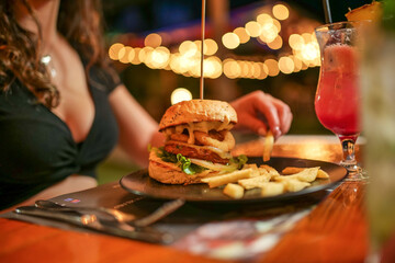 tasty beef sandwich in black background