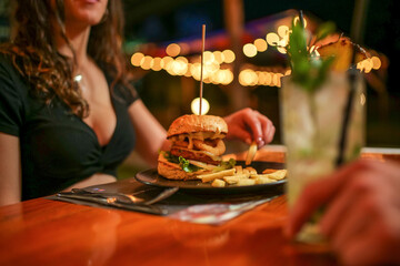 tasty beef sandwich in black background