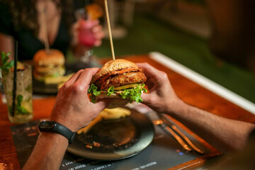 tasty beef sandwich in black background