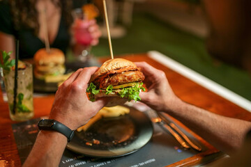 tasty beef sandwich in black background