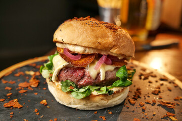 tasty beef sandwich in black background