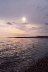 Fototapeta premium Beautiful Sunset At The Sea With Colorful Rays And Clouds
