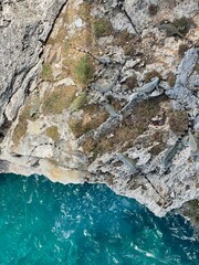 rocky coast of the sea from above