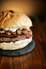 tasty beef sandwich in black background
