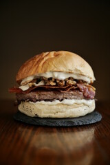 tasty beef sandwich in black background