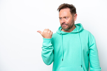 Fototapeta premium Middle age caucasian man isolated on white background unhappy and pointing to the side