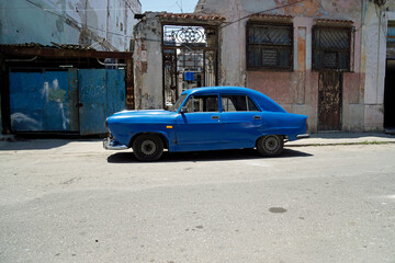 blue old classic car in the streets of havana