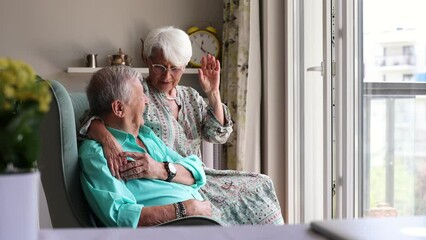 Happy senior couple at home
 - Powered by Adobe