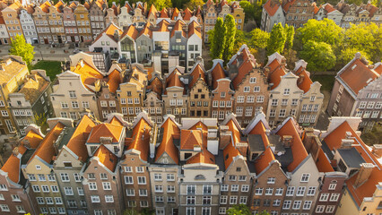 A drone view of the old town houses in Gdańsk in the morning.  