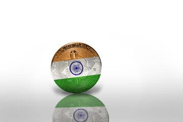 bitcoin with the national flag of india on the white background. bitcoin mining concept.