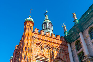 Fototapeta na wymiar Red brick church tower in the center of the city of Gdansk
