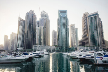 Dubai Marina with Luxury Yacht harbor and modern glass towers, Dubai, UA
