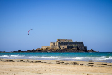 Fort National and a kite surfer on sea in Saint-Malo city, Brittany, France