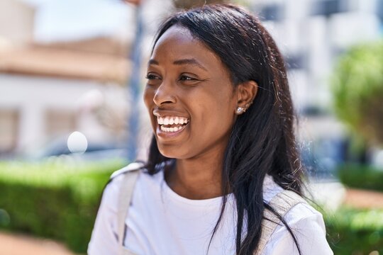Young african american woman smiling confident standing at park