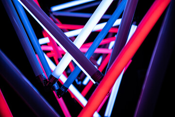 black background with red and blue LED Fluorescent tube in the dark, white light