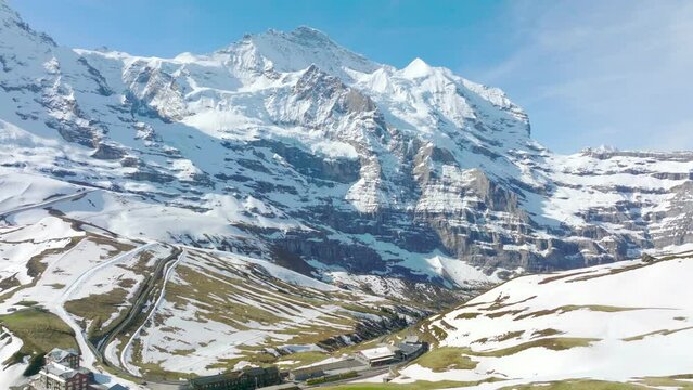 snowy Jungfrau peak in Switzerland, beautiful Swiss nature in Bernese Alps near Kleine Scheidegg mountain pass, typical Swiss alpine landscape