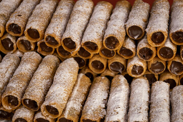 small rolls of sweet dough filled with dulce de leche. High calorie dessert.