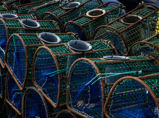 Metal and plastic baskets to fish for crabs and squid.