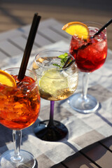 aperitif with aperol crisps on a table