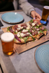 aperitif with aperol crisps on a table