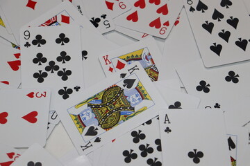Mixed playing cards . Background or Wallpaper.