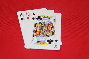 Deck of playing cards on green background