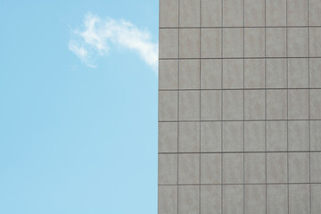 Abstract architecture. Close up of a modern building with blue sky.