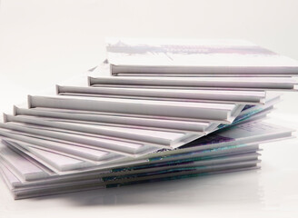a stack of photo books and magazines