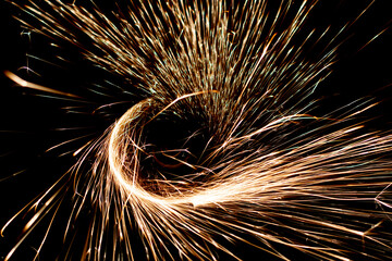  sparks in the dark. lines of light.