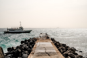 Fototapeta na wymiar SENEGAL - Secondary pier and the ferry linking Gorée island to Dakar