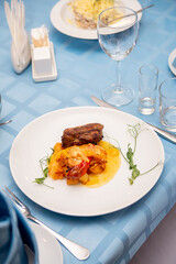 a plate of semolina dish on a served table. wedding banquet celebration
