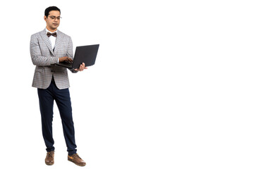 The businessman works at the computer. A full -length man. A man with a laptop on a white background. A businessman in a light suit.